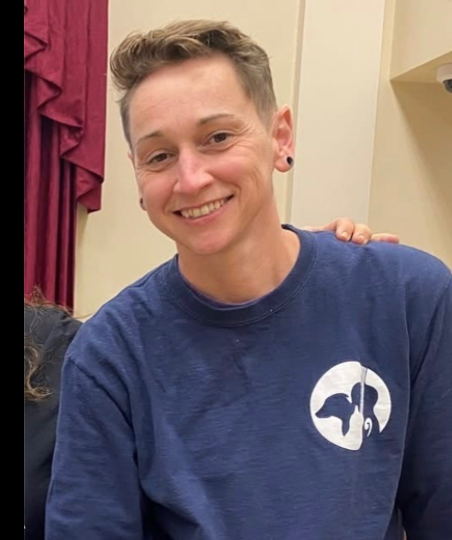Ashley Harrington smiling in scrubs